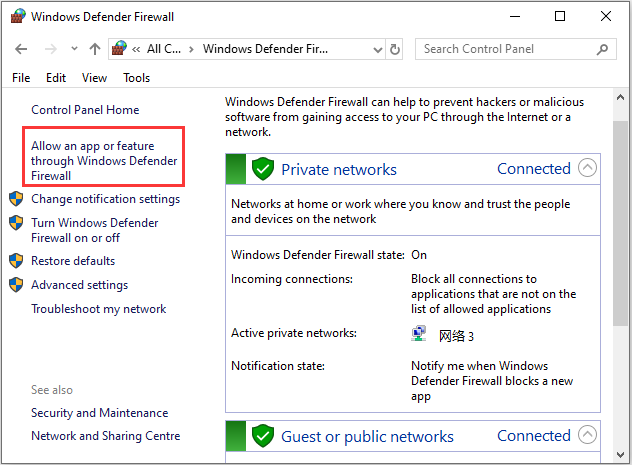 Klik op Een app of functie toestaan ​​via Windows Defender Firewall